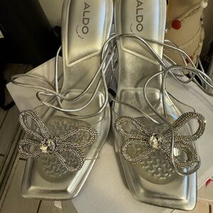 Sliver Aldo Steppy heels used ones